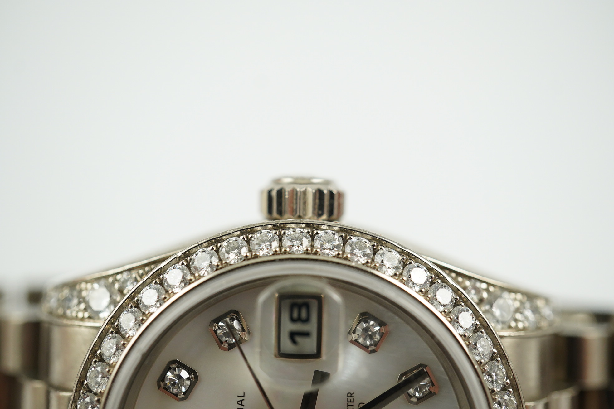 A lady's 2006 18ct white gold and diamond Rolex Oyster Perpetual Datejust wrist watch, on an 18ct white gold Rolex bracelet with deployment clasp